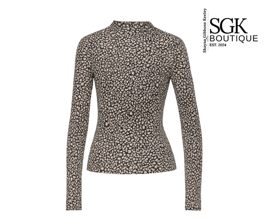Leopard print long-sleeve top on a white background with SGK Boutique branding.