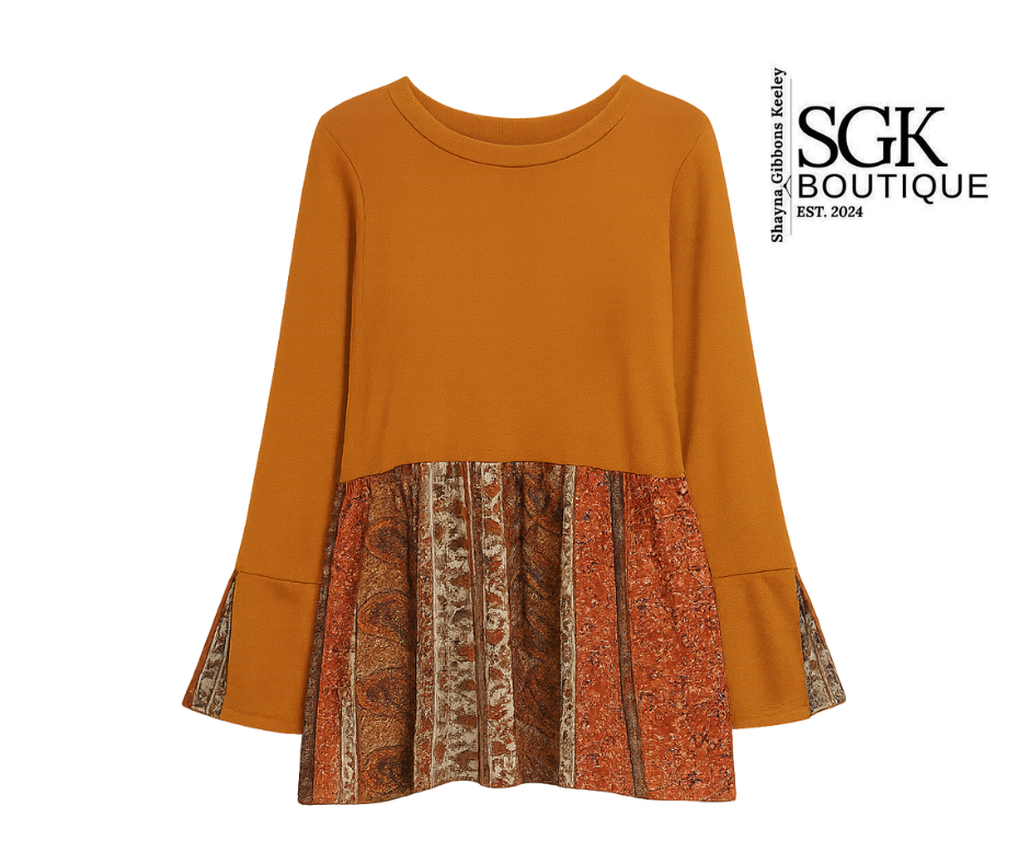 Mustard yellow dress with patterned bottom half on a white background, featuring SGK Boutique logo.