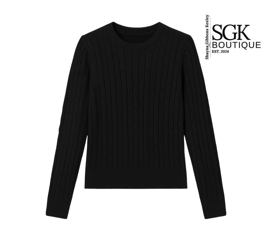 Black ribbed long-sleeve shirt on a white background with SGK Boutique logo.