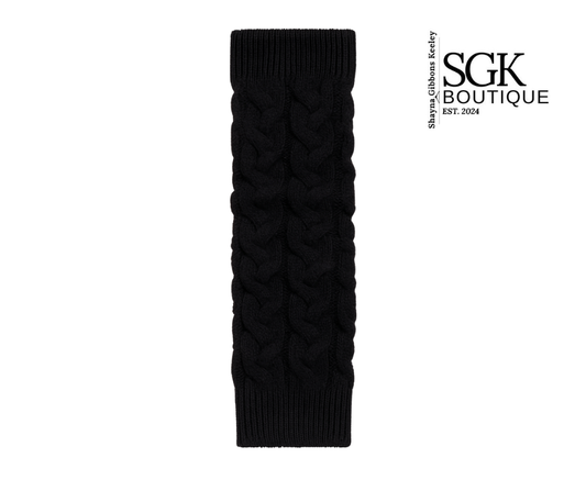 Black knitted sleeve on a white background with SGK Boutique logo.
