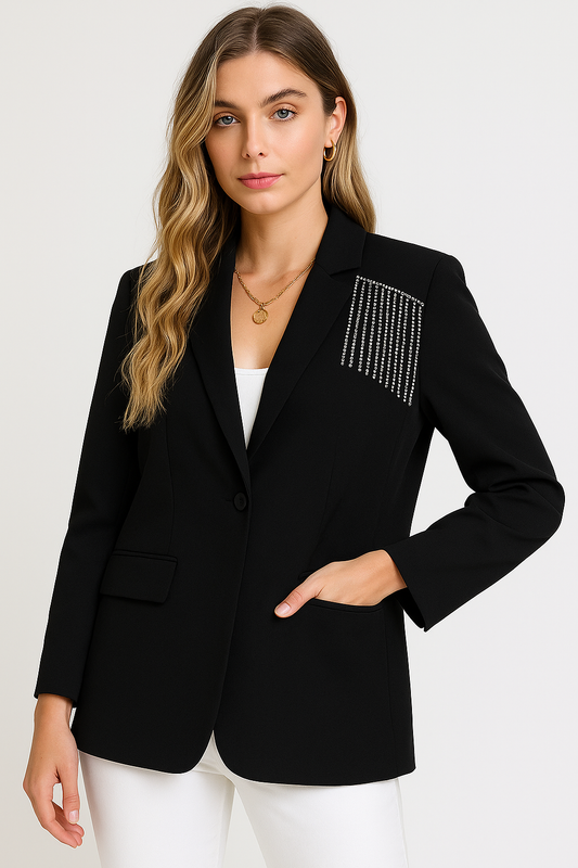 Woman wearing a black blazer with a decorative pocket on a white background