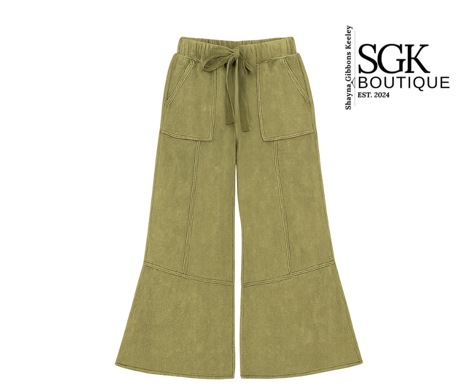 Green wide-leg pants with a drawstring waist on a white background, featuring the SGK Boutique logo.