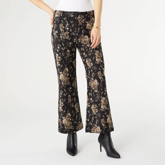 Floral-patterned pants worn by a person on a white background