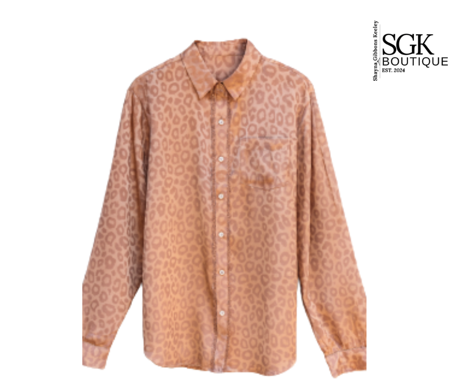 Pink patterned shirt with SGK Boutique logo on a white background