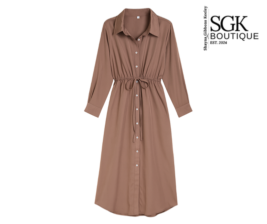 Mocho dress with a belt on a white background, featuring the SGK Boutique logo.