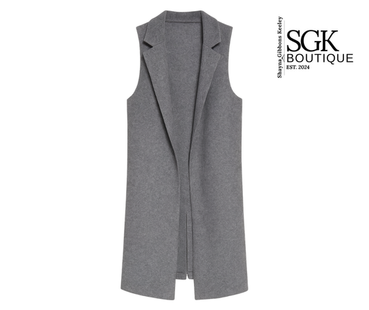 Gray sleeveless vest on a white background with SGK Boutique logo.