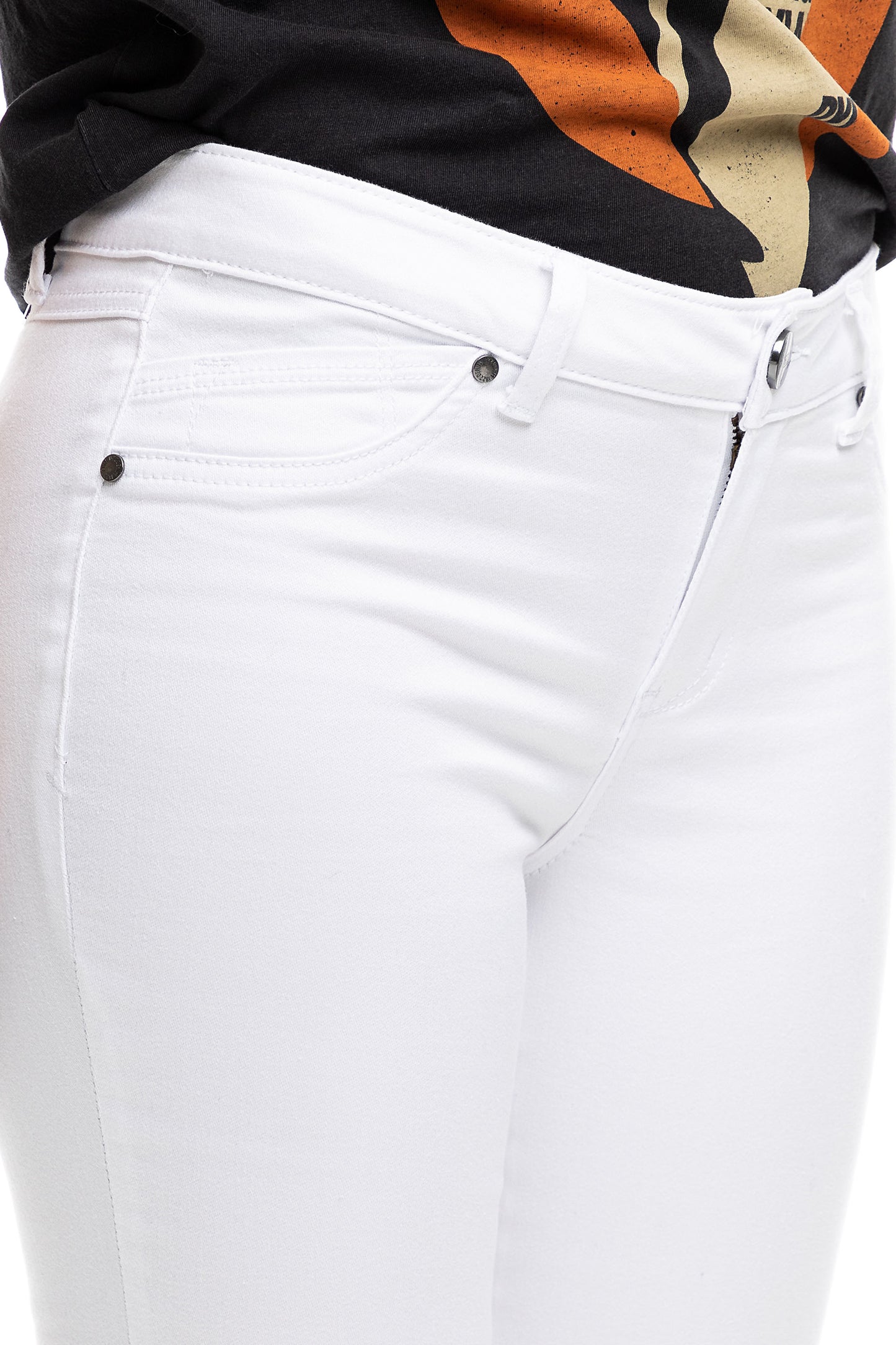 White jeans with a colorful top on a white background