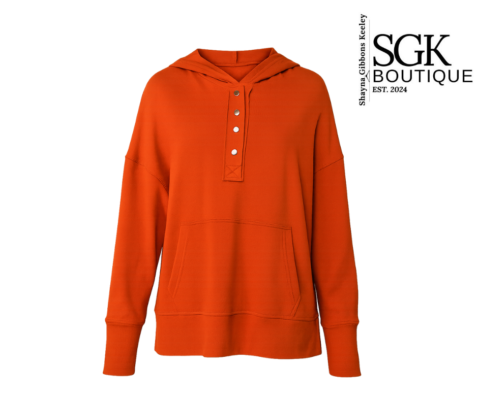Orange hoodie with button details on a white background, featuring SGK Boutique logo.