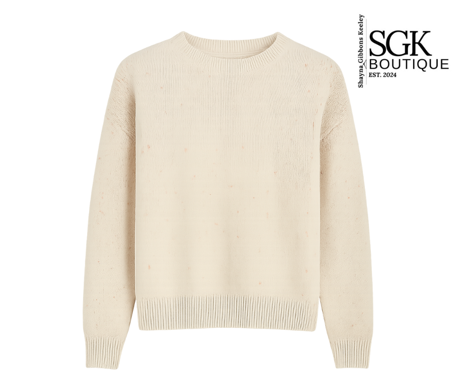 Beige sweater on a white background with SGK Boutique logo.