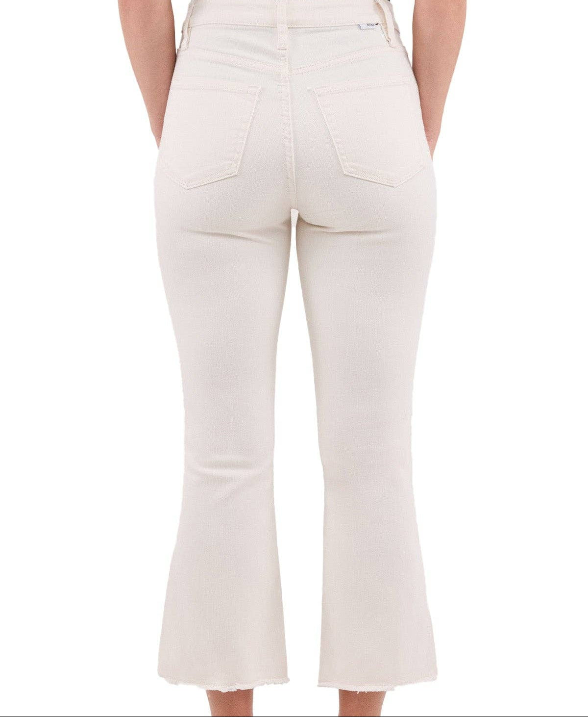 White pants worn by a person on a white background