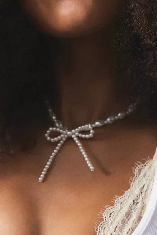 BEADED PEARL BOW TIE NECKLACE