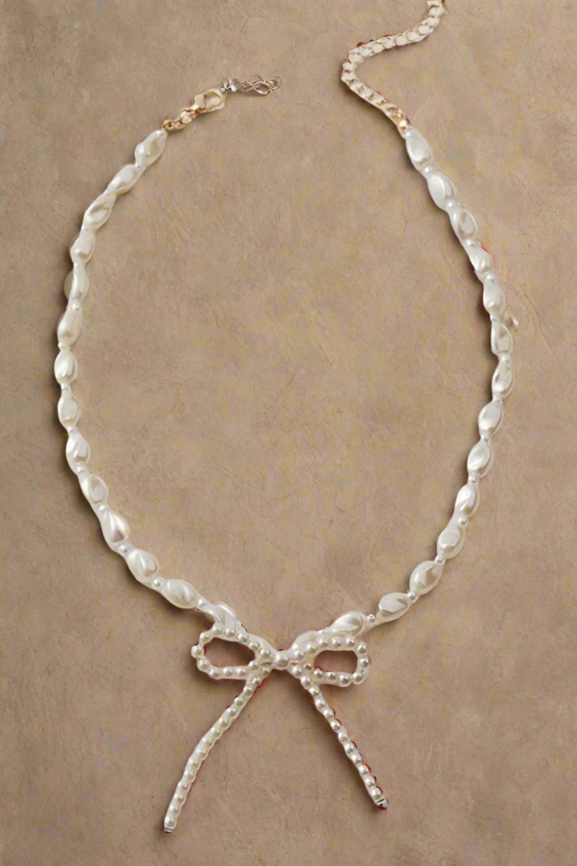 BEADED PEARL BOW TIE NECKLACE