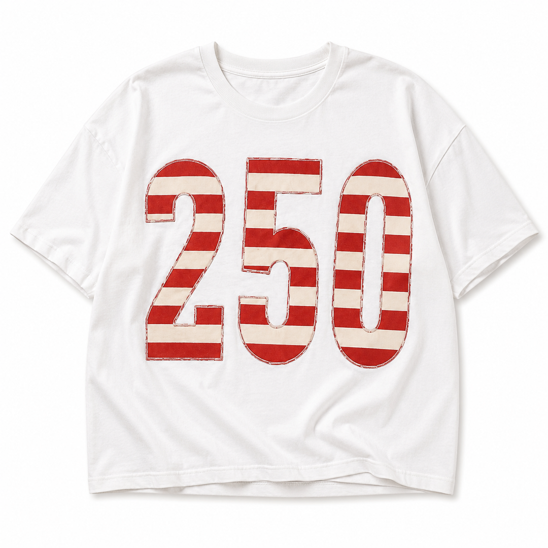 A white short-sleeve crewneck t-shirt featuring a large graphic print of the number &