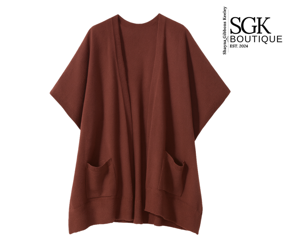 Brown poncho with pockets on a white background, featuring the SGK Boutique logo.