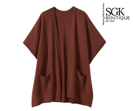 Brown poncho with pockets on a white background, featuring the SGK Boutique logo.