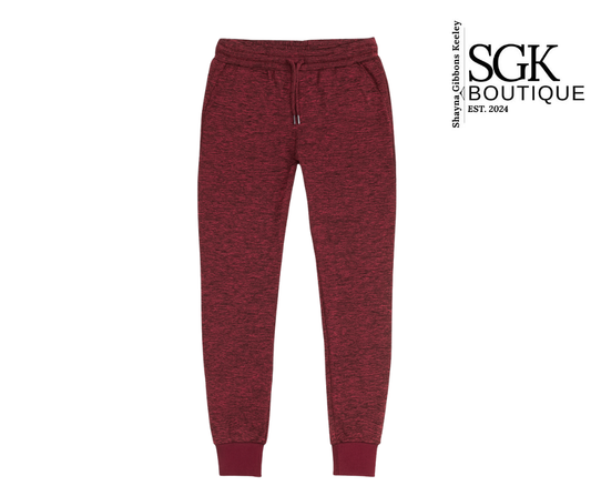 Maroon jogger pants on a white background with SGK Boutique logo.