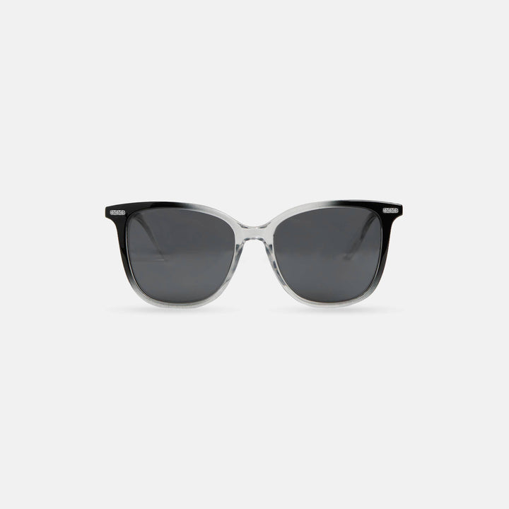 Sunglasses with black frames and dark lenses on a white background