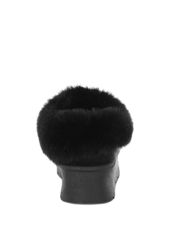 Black fur hat on a white background