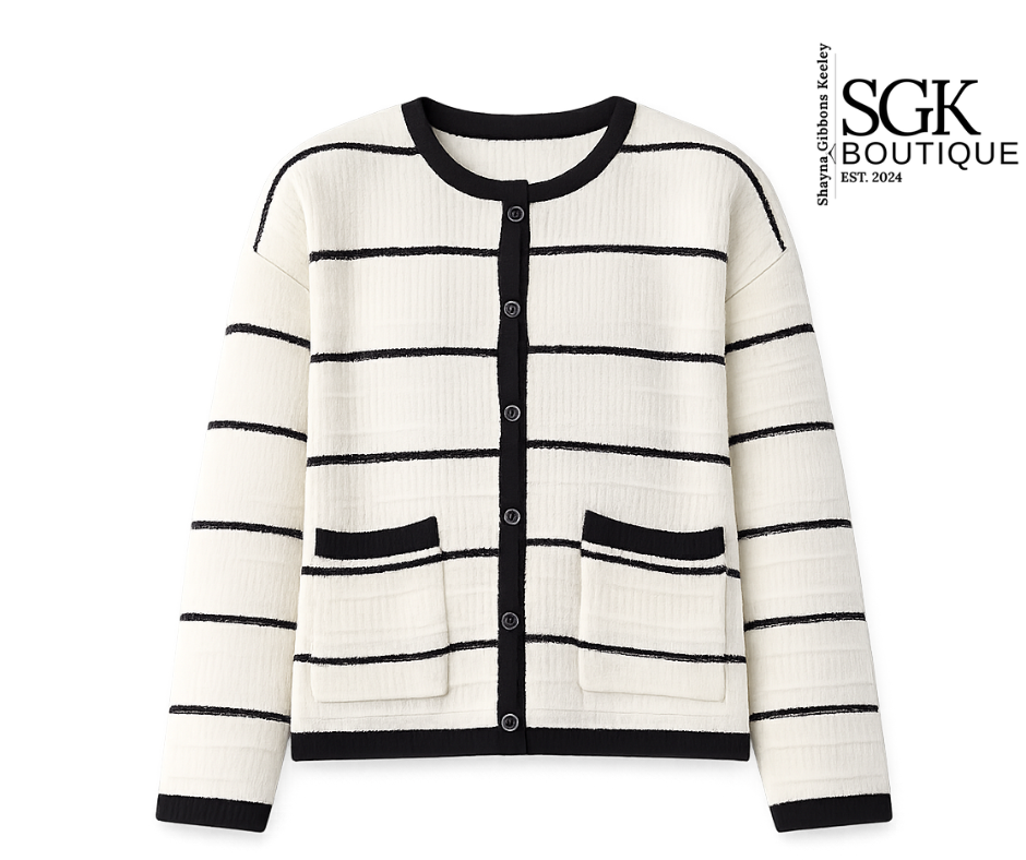 Black and white striped cardigan with SGK Boutique branding on a white background