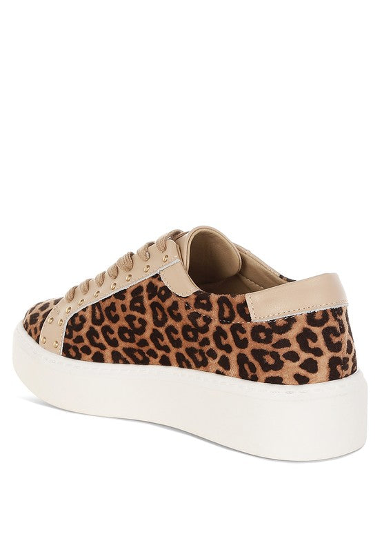 Sneaker with leopard print pattern on a white background