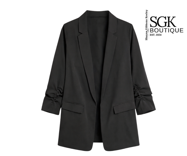 Black blazer on a white background with SGK Boutique logo.