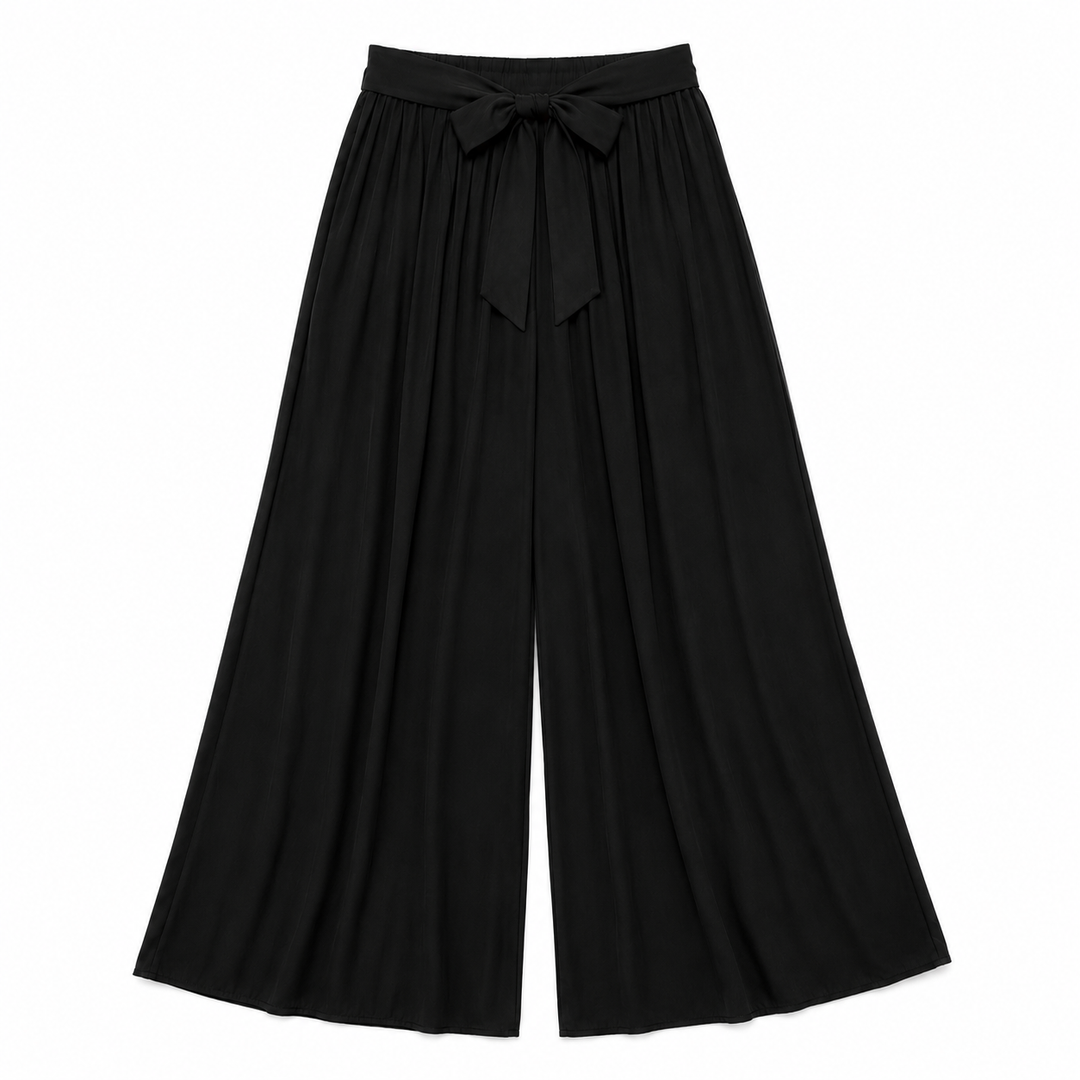 Black pleated skirt on a white background
