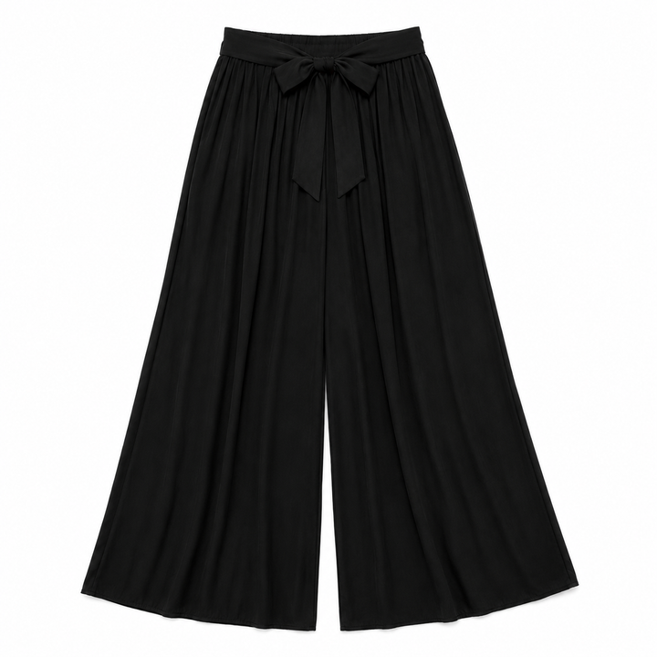 Black pleated skirt on a white background