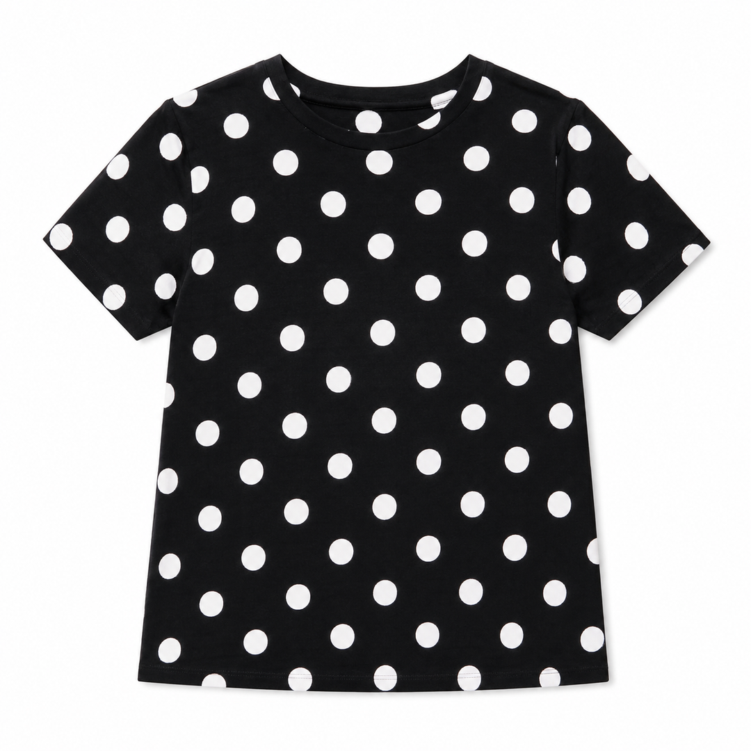 A short-sleeve black t-shirt with a white polka dot pattern, displayed flat against a solid white background.