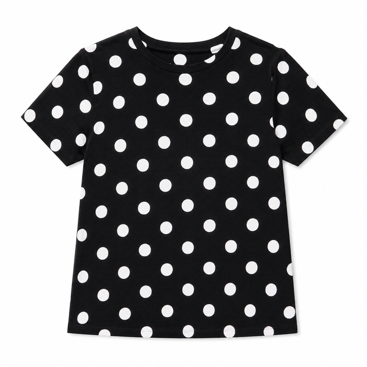 A short-sleeve black t-shirt with a white polka dot pattern, displayed flat against a solid white background.