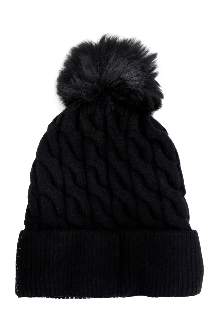 Black knit beanie with a fluffy pom-pom on a white background