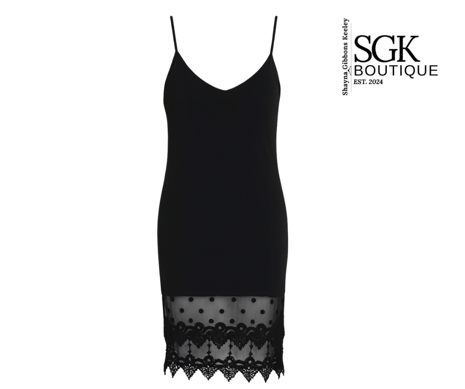 Black slip dress with lace hem on a white background, featuring SGK Boutique logo.