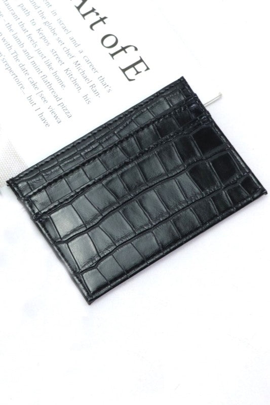 Black crocodile patterned cardholder on a white background