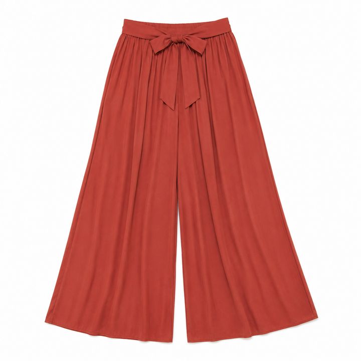 Red wide-leg pants with a tie waist on a white background