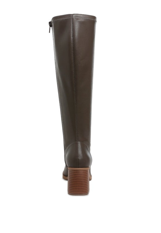 Brown knee-high boot on a white background