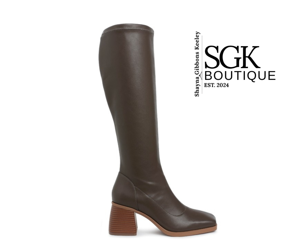 Brown knee-high boot on a white background with SGK Boutique logo.