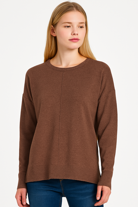 Woman wearing a brown sweater on a white background