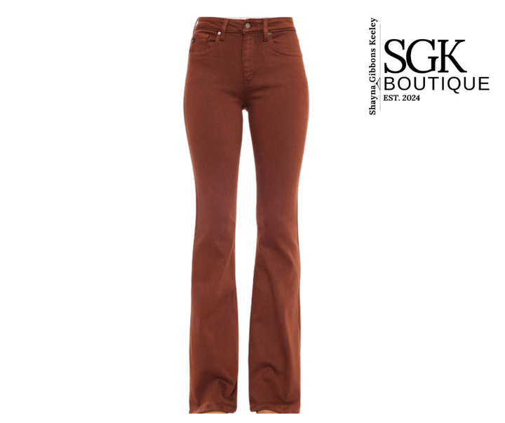 Brown jeans on a white background with SGK Boutique logo.