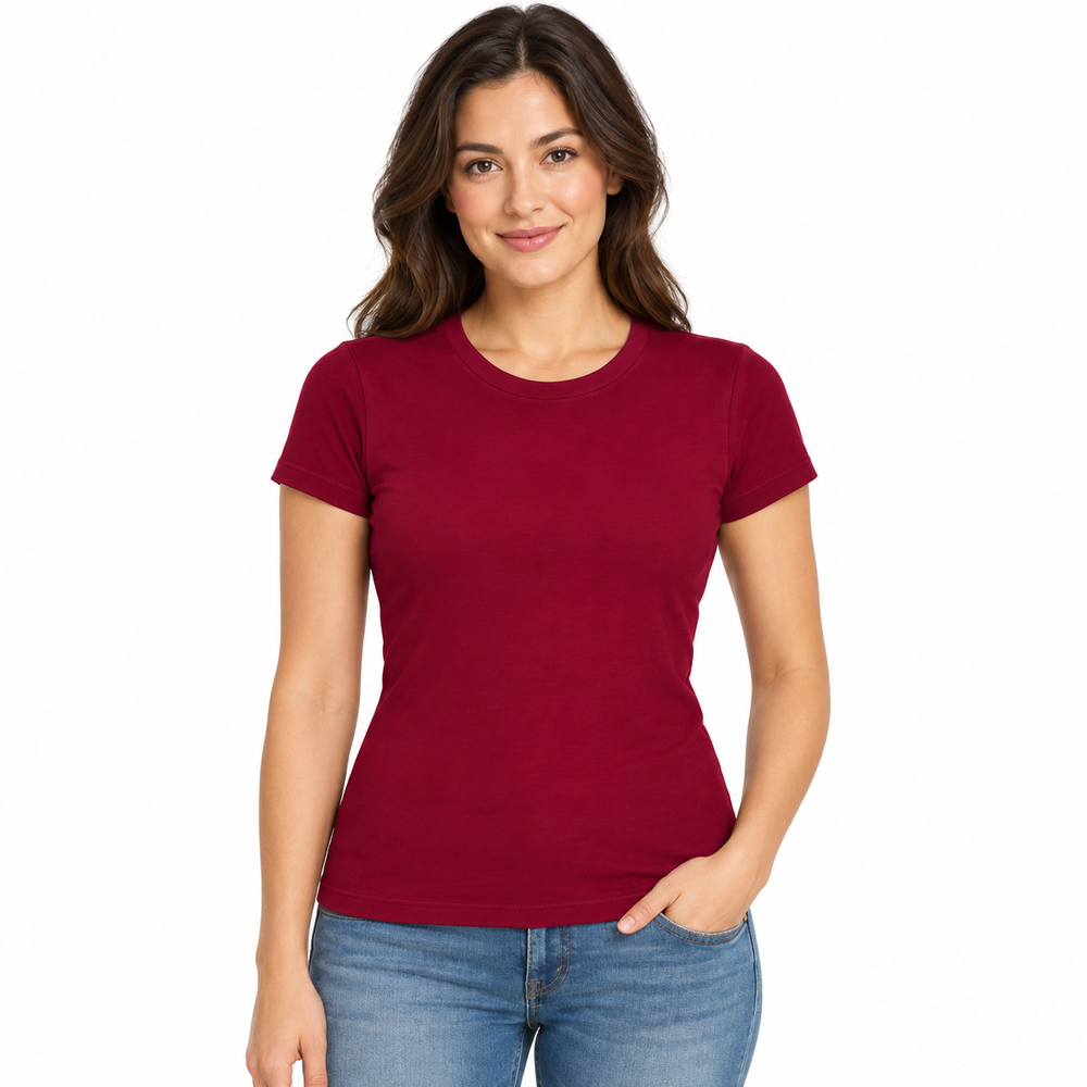 A woman modeling a short-sleeve crewneck t-shirt in solid burgundy, paired with blue jeans, against a plain white background.