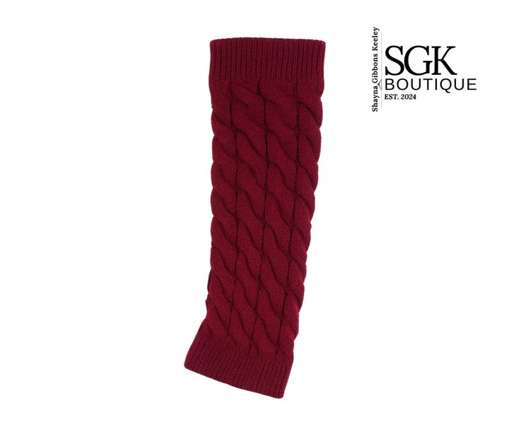 Red knitted leg warm on a white background with SGK Boutique logo.