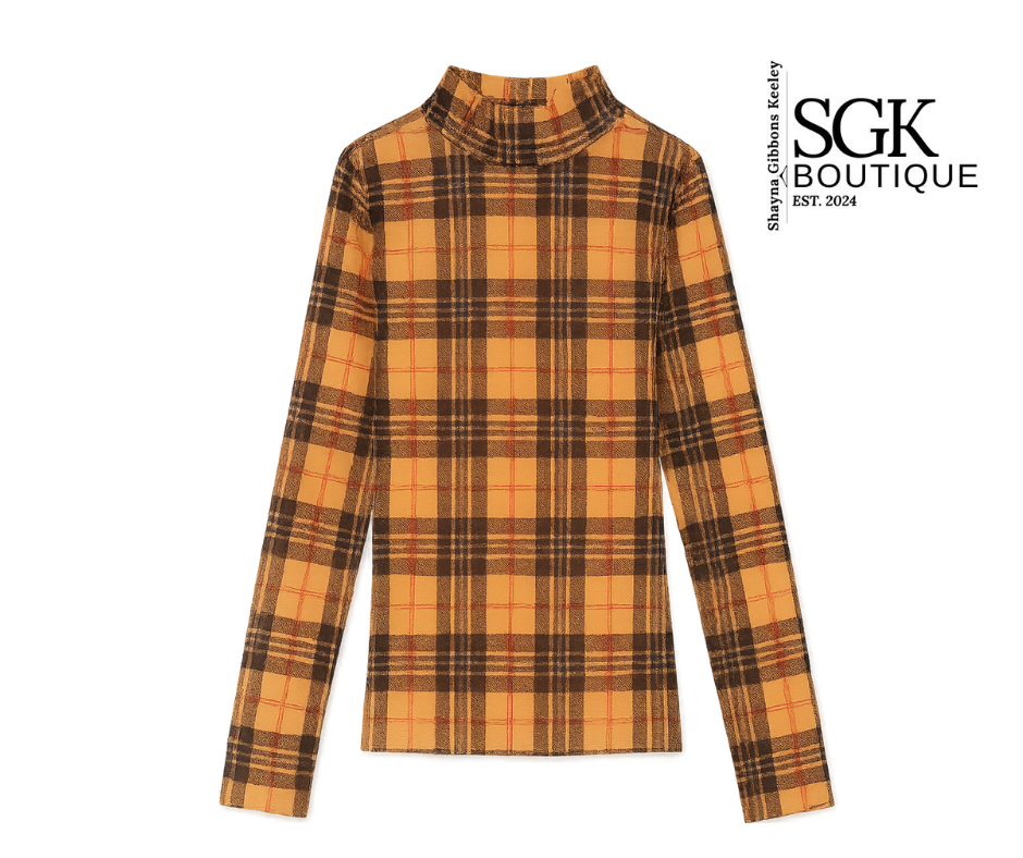 Plaid turtleneck shirt on a white background with SGK Boutique logo.