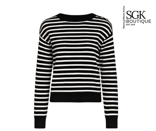 Black and white striped sweater with SGK Boutique branding on a white background