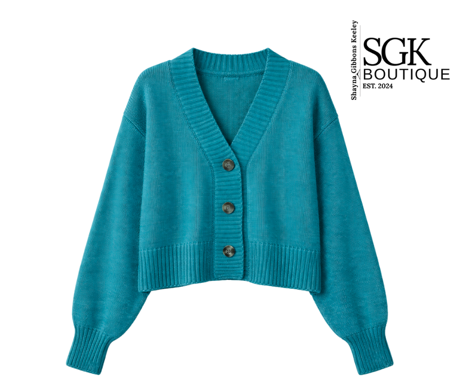 Teal cardigan with buttons on a white background, featuring the SGK Boutique logo.