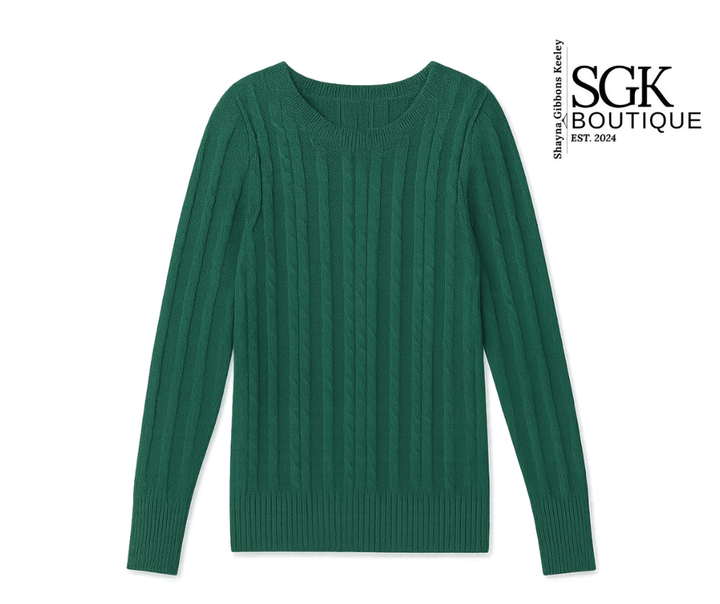 Green sweater on a white background with SGK Boutique logo.