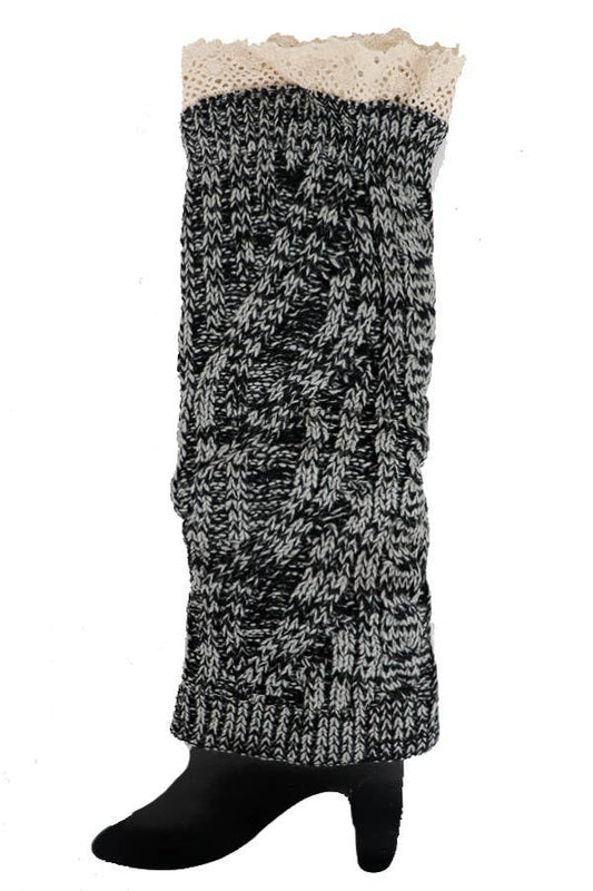 Black and white knitted leg warmers on a white background