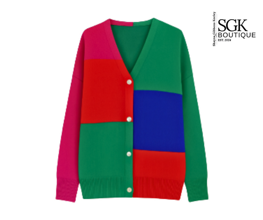 Color-blocked sweater with pink, red, green, and blue sections on a white background, featuring the SGK Boutique logo.