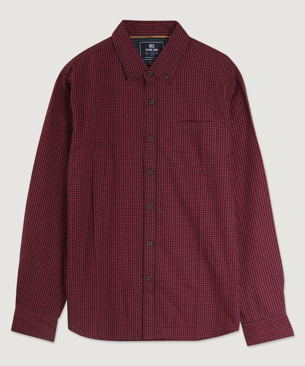 Red and black checkered shirt on a light gray background