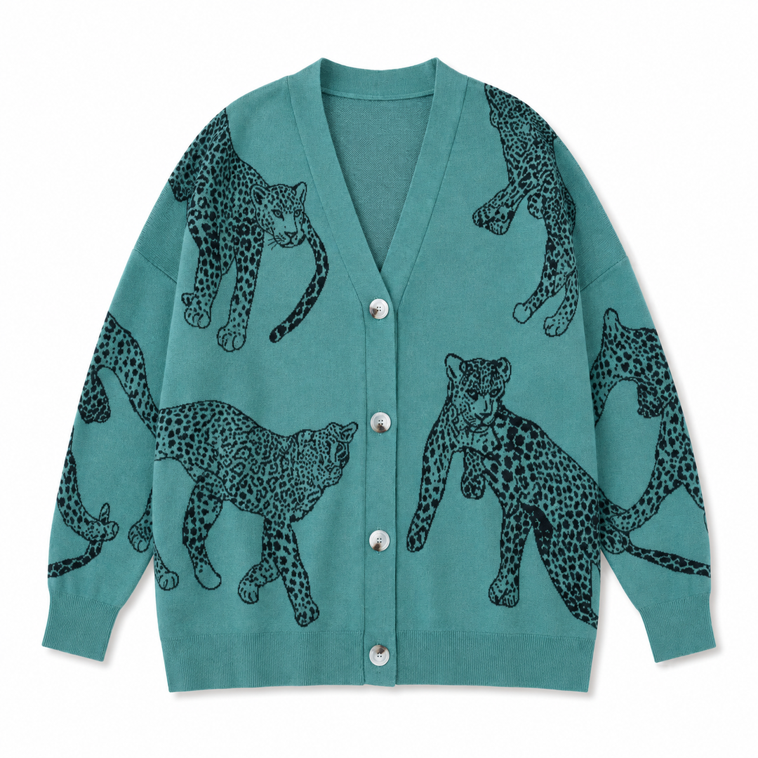 A teal cardigan sweater featuring a black and gray spotted leopard print pattern, displayed flat against a solid white background.