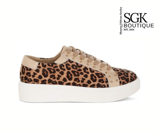Leopard print sneaker with beige accents on a white background, featuring SGK Boutique logo.