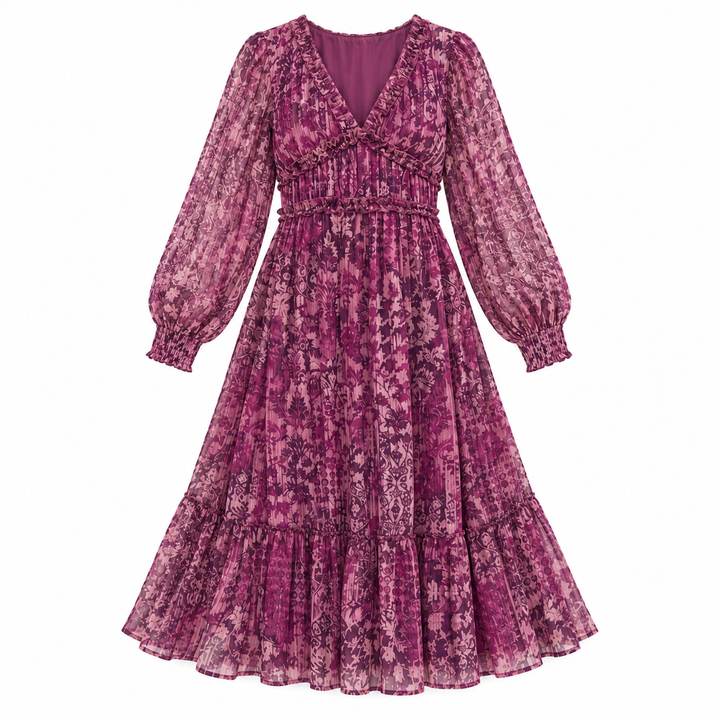 A long-sleeve midi dress in a textured, patterned magenta-purple fabric with a smocked waist and ruffled V-neckline, shown against a plain white background.