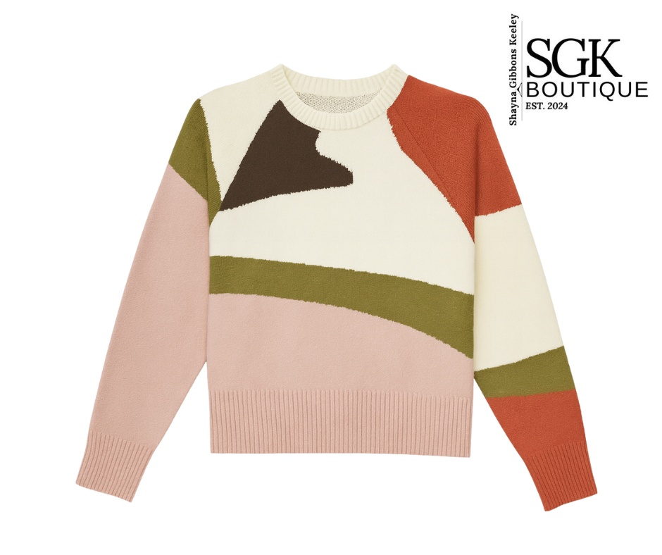 Color-blocked sweater with geometric design on a white background, featuring the SGK Boutique logo.
